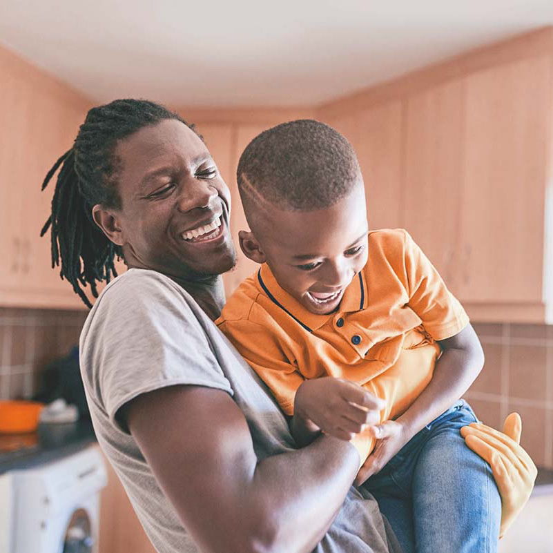 father playing with his son